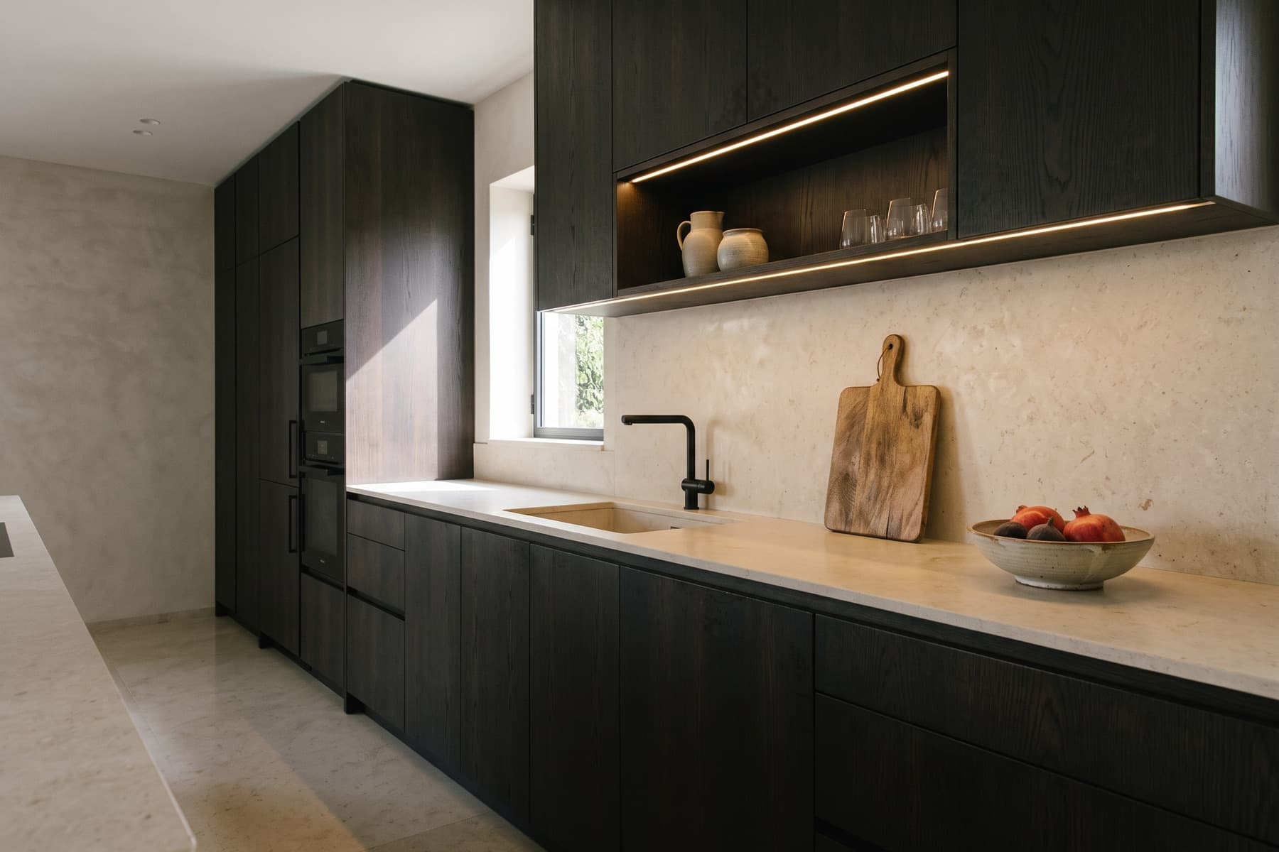 Talbiya residence: kitchen with dark cabinetry