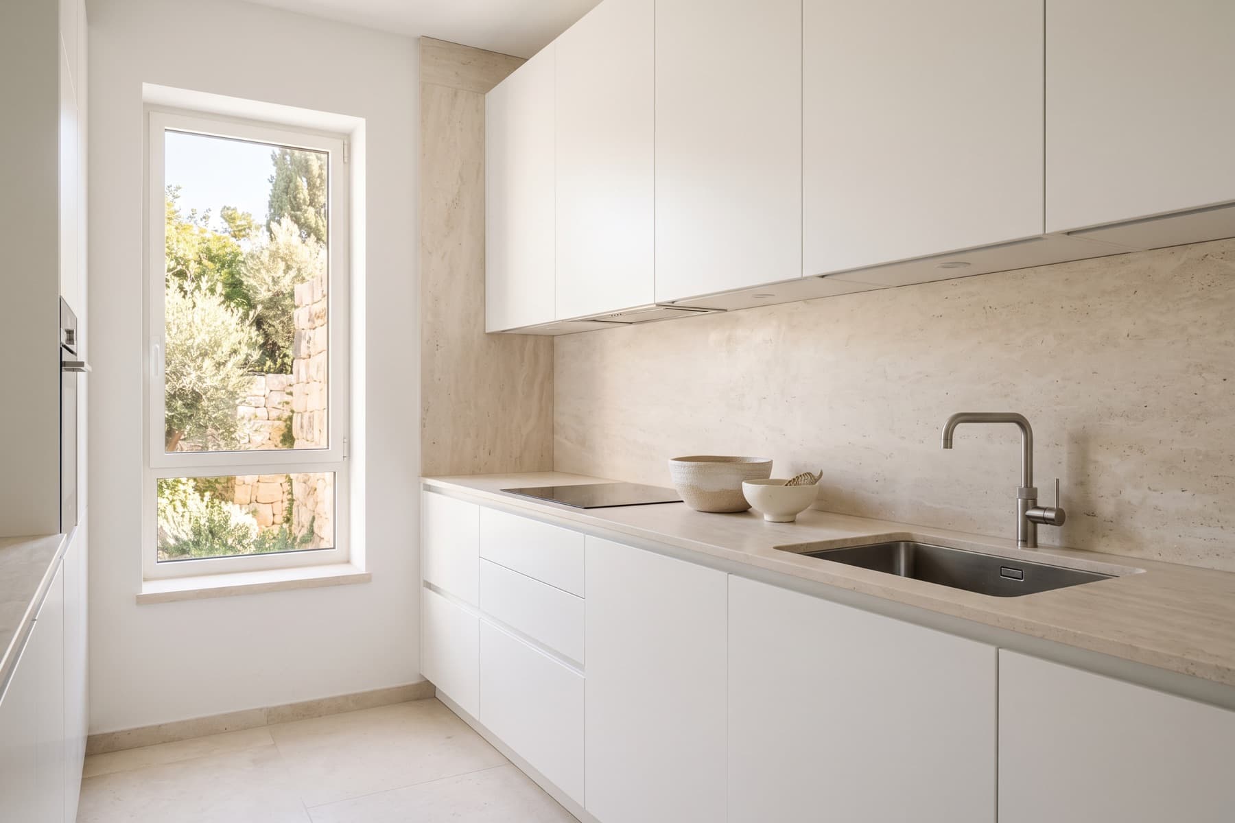 Neve Tzedek residence: kitchen in painted joinery and stone