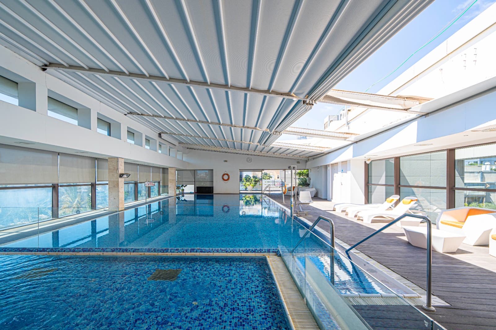 Residents' pool beneath a retractable roof