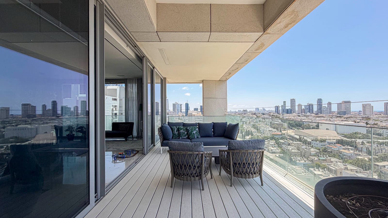 Sheltered outdoor lounge on the wraparound terrace
